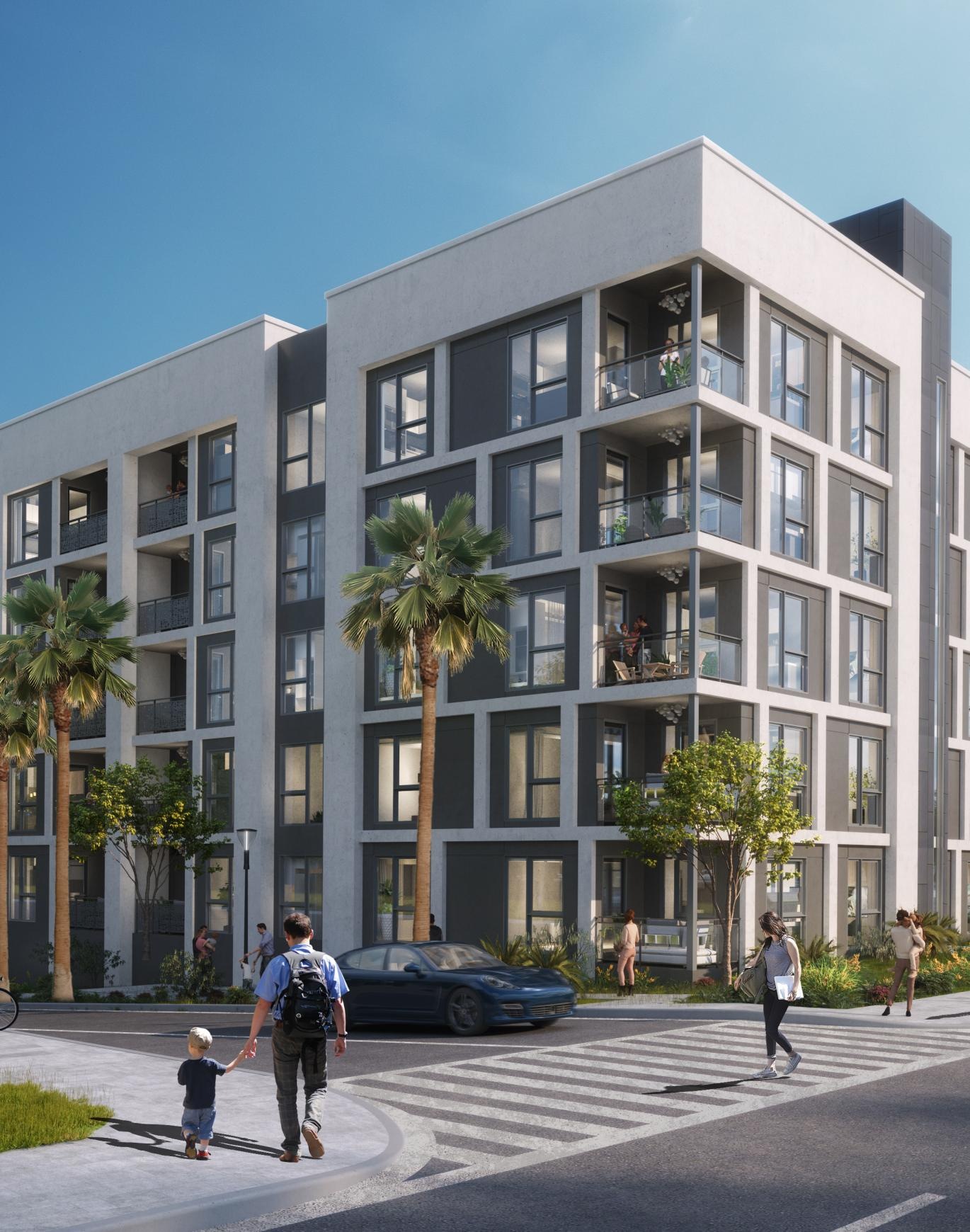 a building with palm trees and people walking on the sidewalk